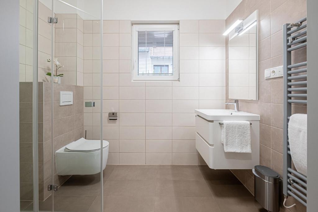 Koupelna v ubytování Apartmány ZaBukem