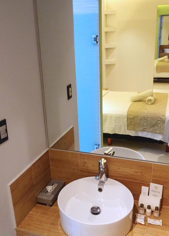 Postel nebo postele na pokoji v ubytování Hotel Kavia Plus