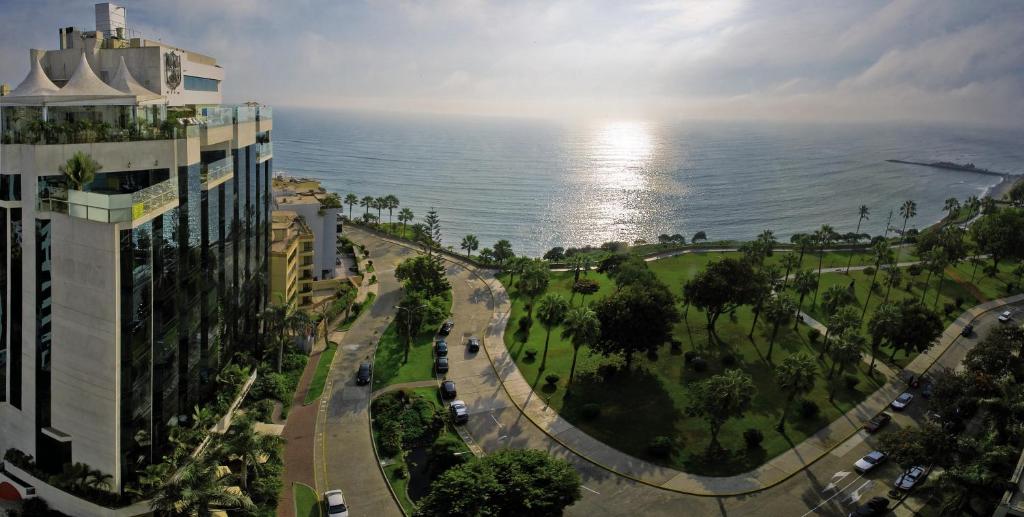 a view of the ocean from a building at Miraflores Park, A Belmond Hotel, Lima in Lima