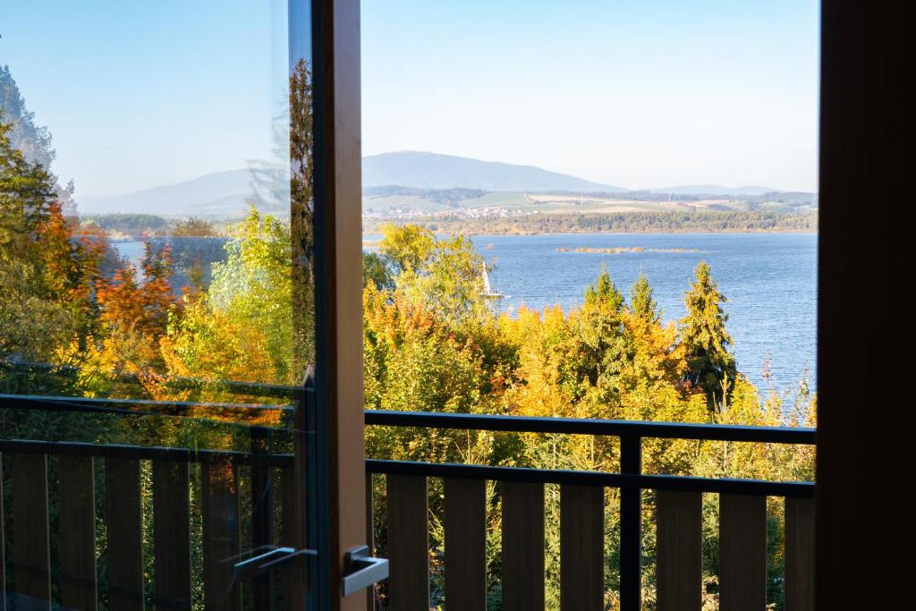 a view of the water from a balcony at AKORD chata in Námestovo