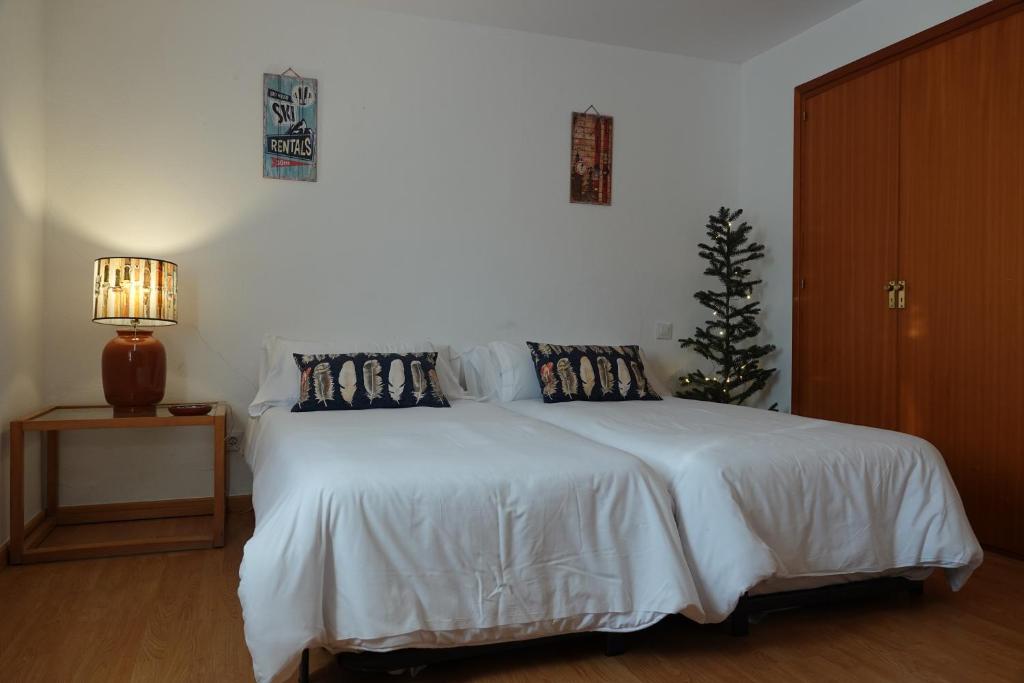 Postel nebo postele na pokoji v ubytování Huegas by PIRINEOS 360 - A 90 metros del Reloj de Formigal