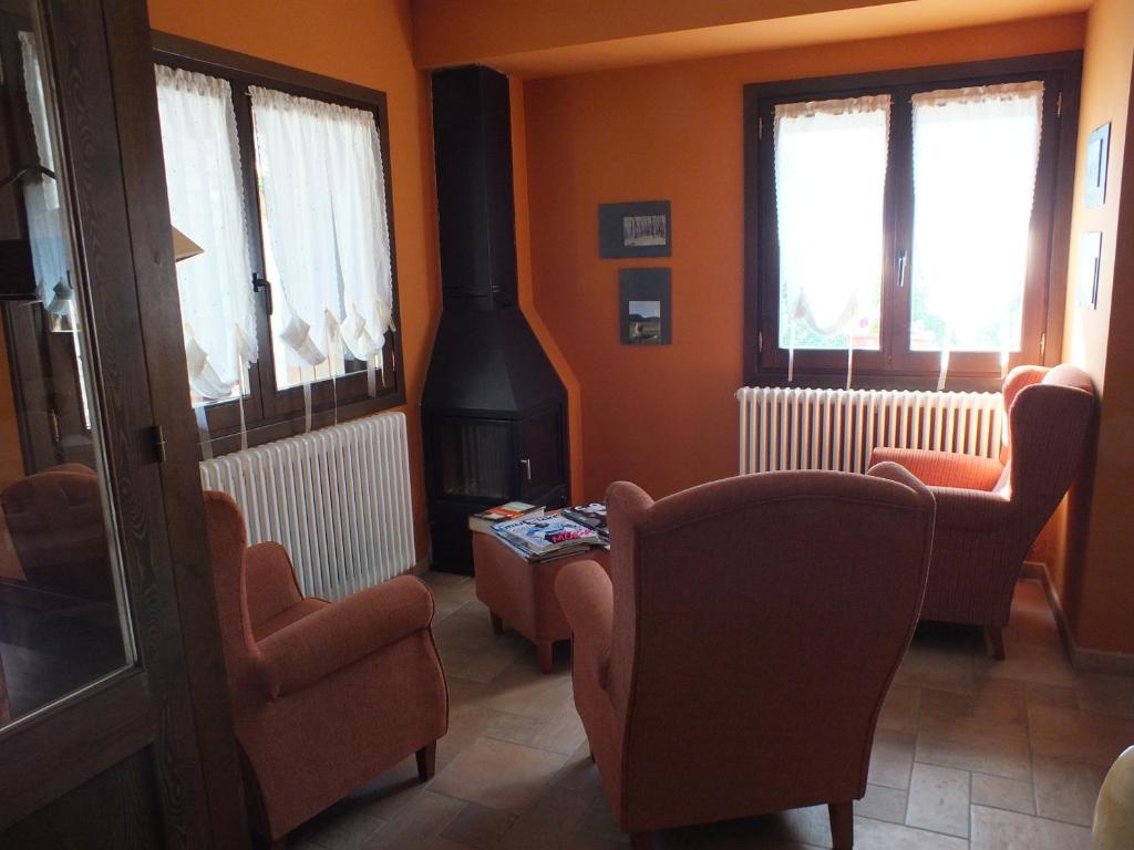 Posezení v ubytování Hotel Areulo