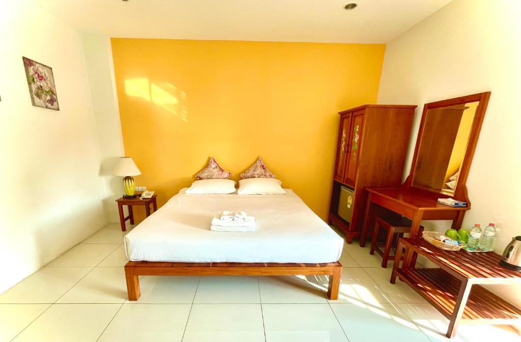 Postel nebo postele na pokoji v ubytování Smile Hua-Hin Resort - SHA Plus