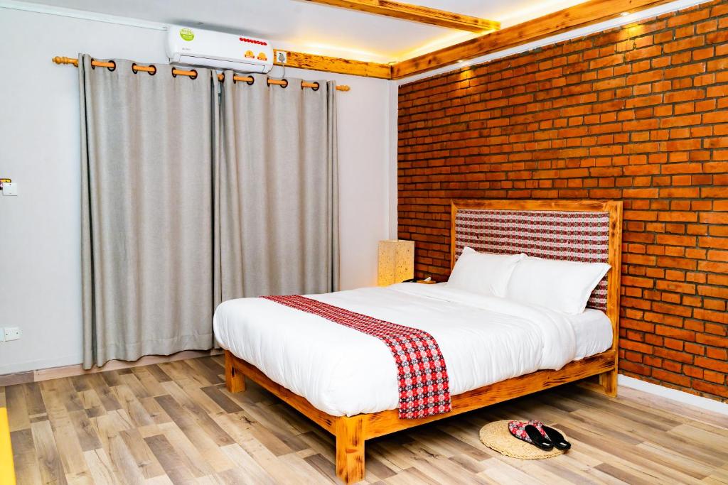 Postel nebo postele na pokoji v ubytování Silu Homes by Hostmandu
