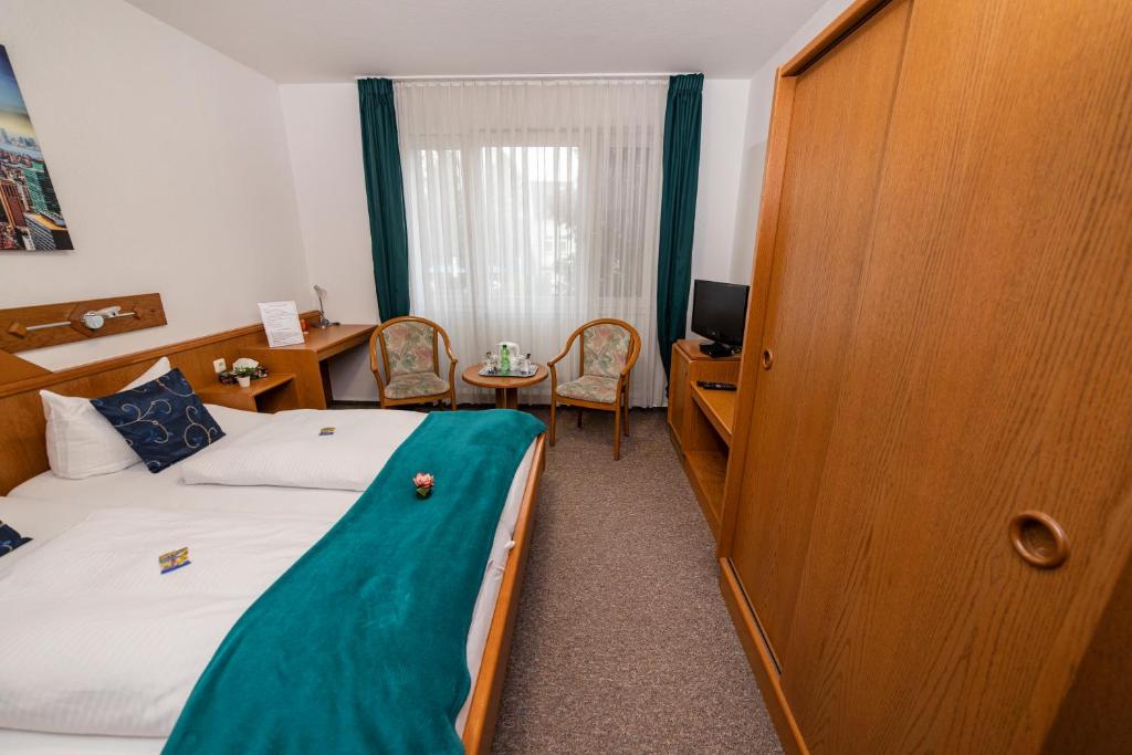 Hotel am Schlosspark Essen - Resim 37