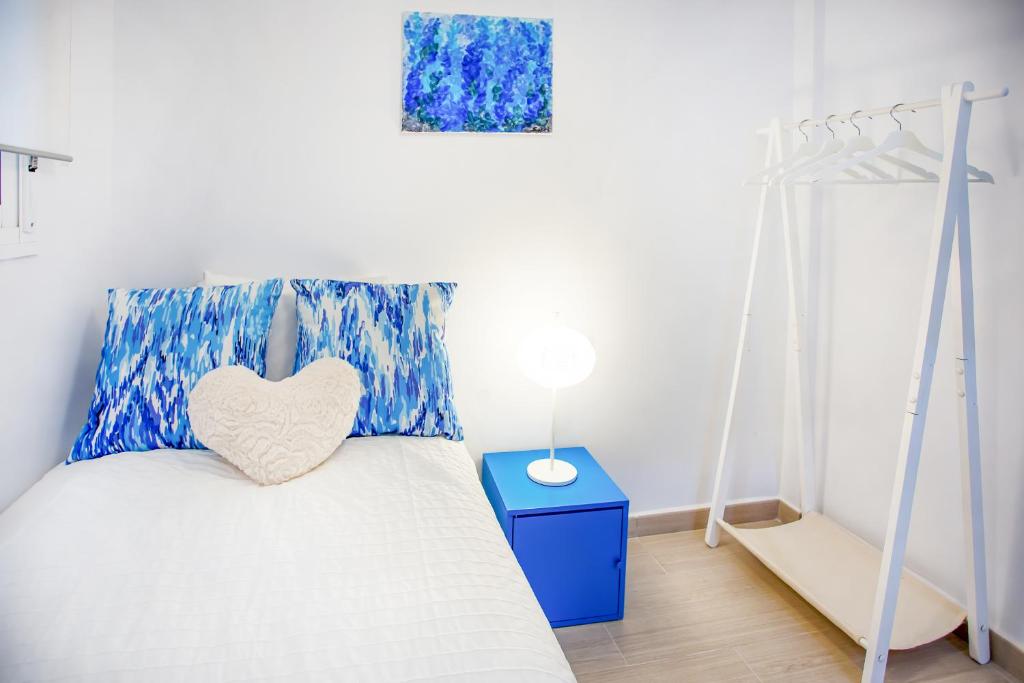 A bed or beds in a room at Alonso de Palencia City Center Apartment