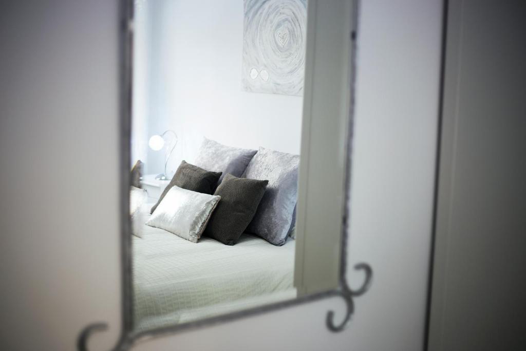 A bed or beds in a room at Alonso de Palencia City Center Apartment