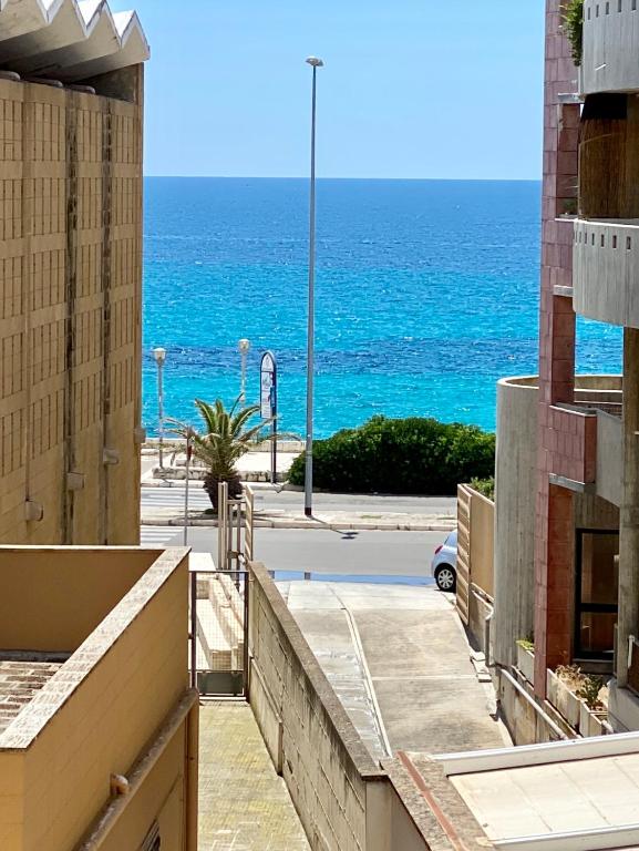 a view of the ocean from a building at CASA Di MIRKO in Gallipoli