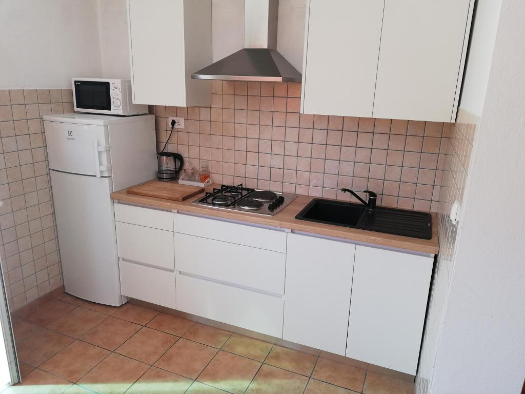 Kuchyň nebo kuchyňský kout v ubytování Shell Bay Apartments