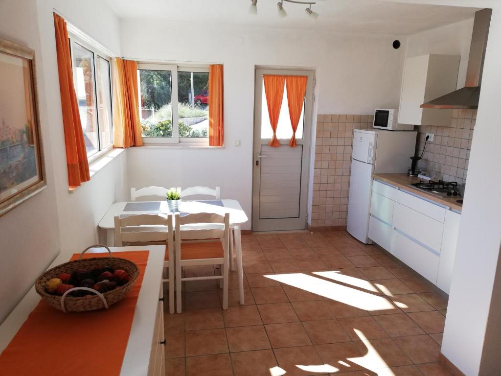 Kuchyň nebo kuchyňský kout v ubytování Shell Bay Apartments