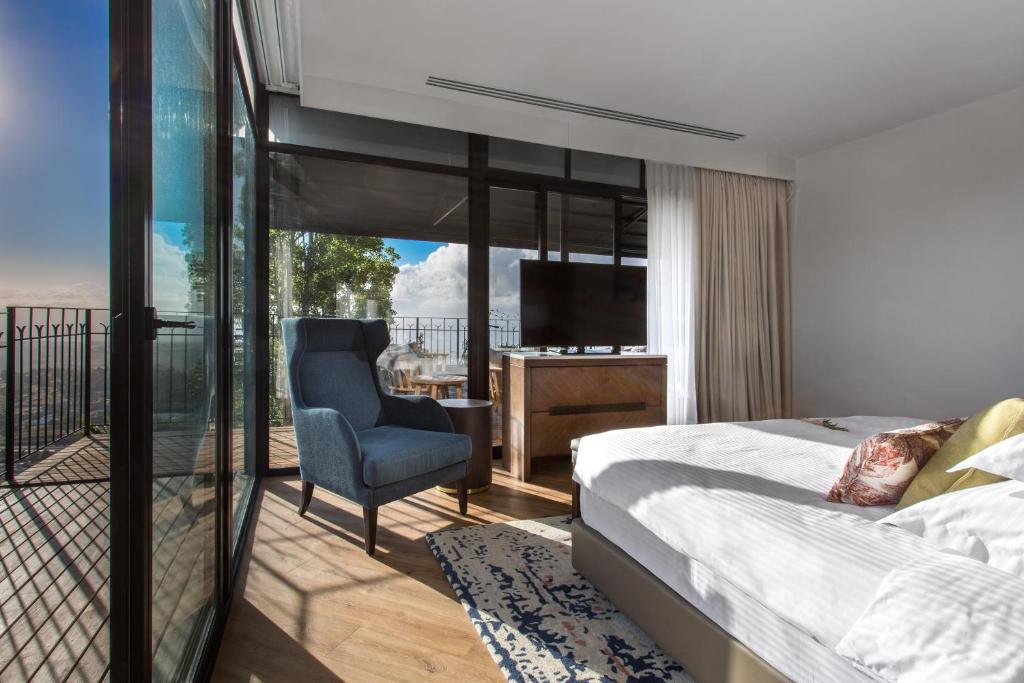 Postel nebo postele na pokoji v ubytování Mizpe Hayamim by Isrotel Exclusive
