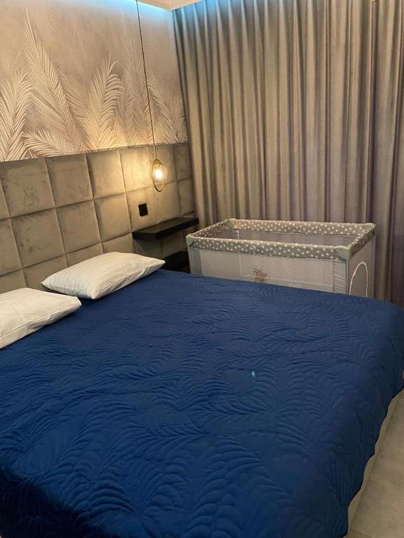 Posteľ alebo postele v izbe v ubytovaní MALAGA APARTAMENTY BALTICUS