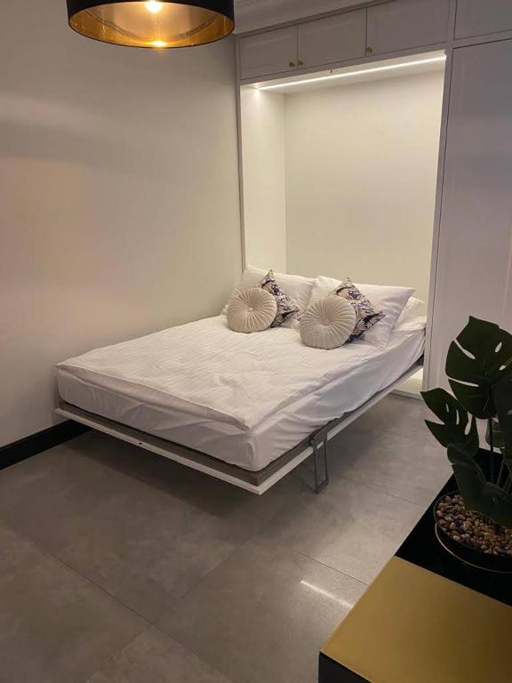 Posteľ alebo postele v izbe v ubytovaní MALAGA APARTAMENTY BALTICUS