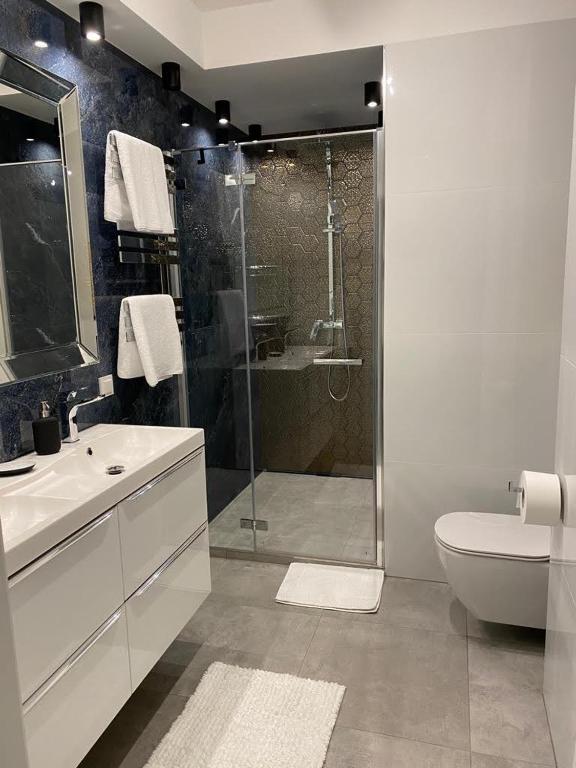 Kúpeľňa v ubytovaní MALAGA APARTAMENTY BALTICUS