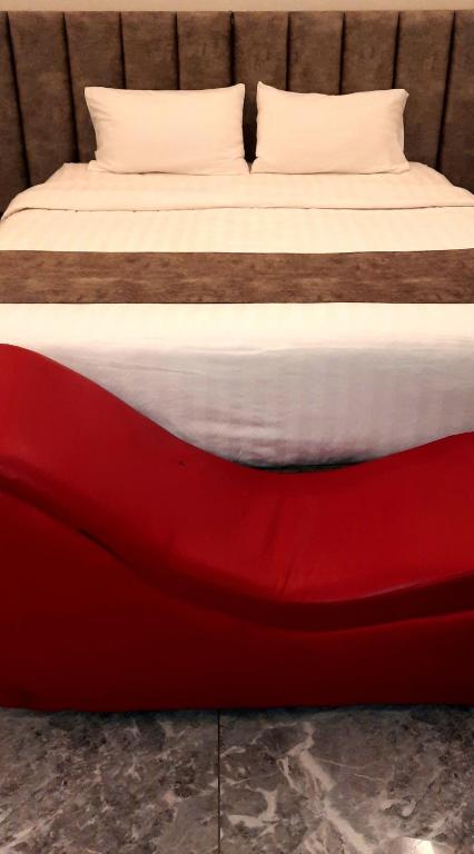 Postel nebo postele na pokoji v ubytování جولدن نيو جوان - Golden New Gewan Hotel