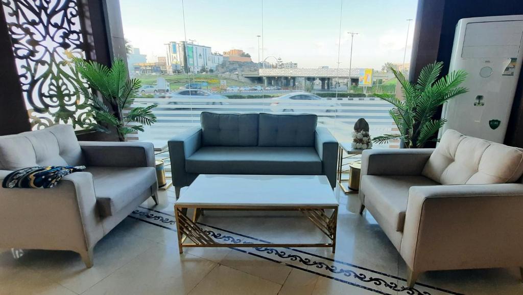 Posezení v ubytování جولدن نيو جوان - Golden New Gewan Hotel