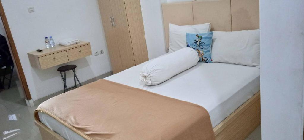 Guest House Pinarak 2 Syariah near GOR Satria Purwokerto Mitra RedDoorz - Deluxe -Raum