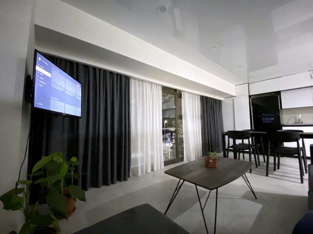 TV a/nebo společenská místnost v ubytování GSS Apartment