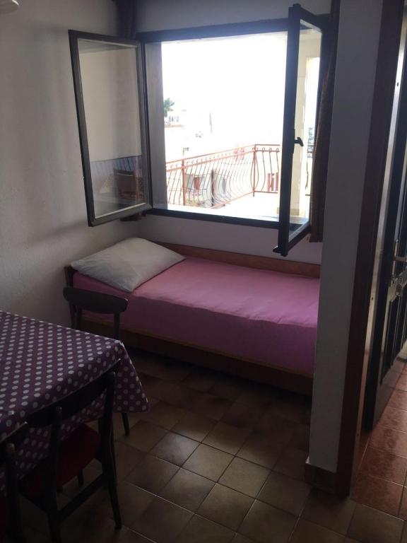 Postel nebo postele na pokoji v ubytování Apartment in Podgora with sea view, terrace, WiFi 4492-5