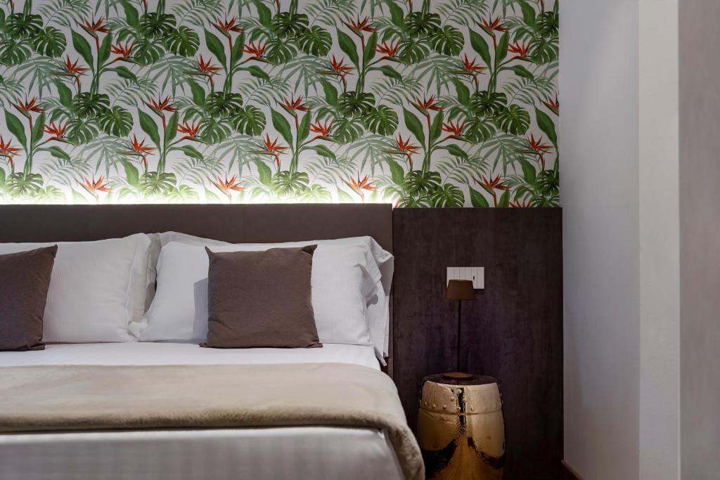 Postel nebo postele na pokoji v ubytování Civico25 Suite Hotel