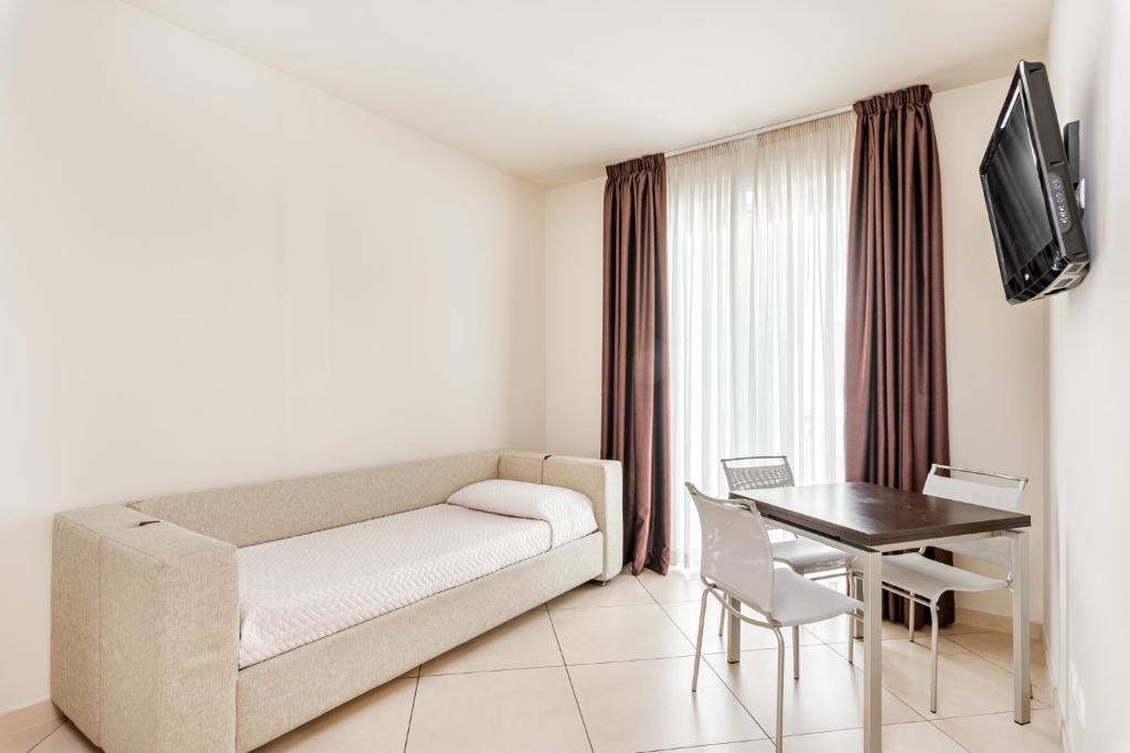 TV a/nebo společenská místnost v ubytování Hotel & Residence Exclusive