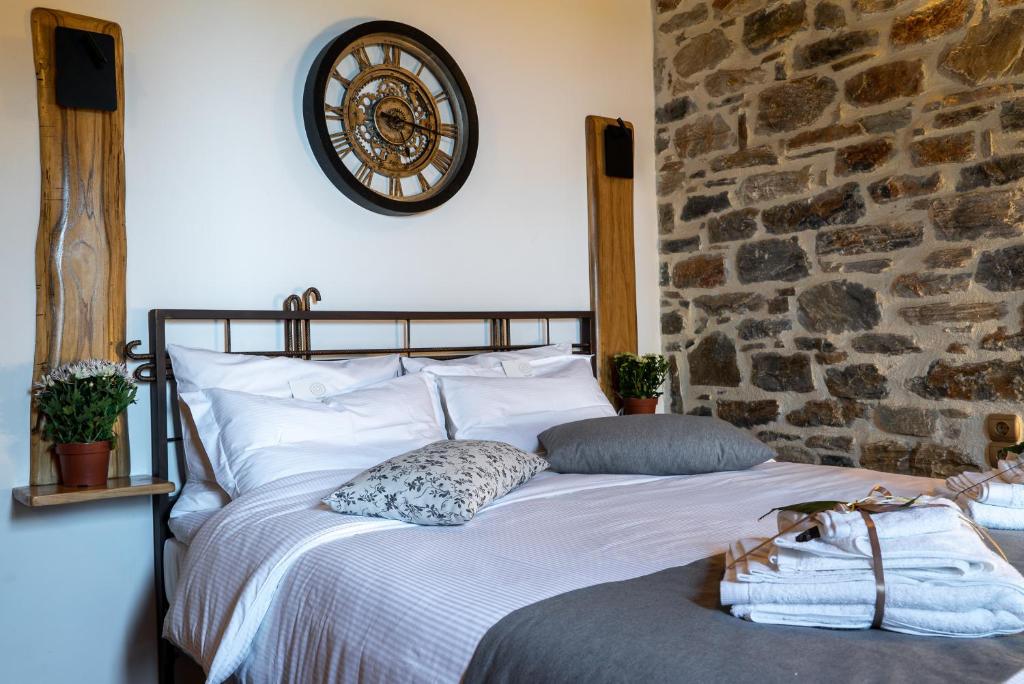 Łóżko lub łóżka w pokoju w obiekcie Helene Eco Luxury Villa