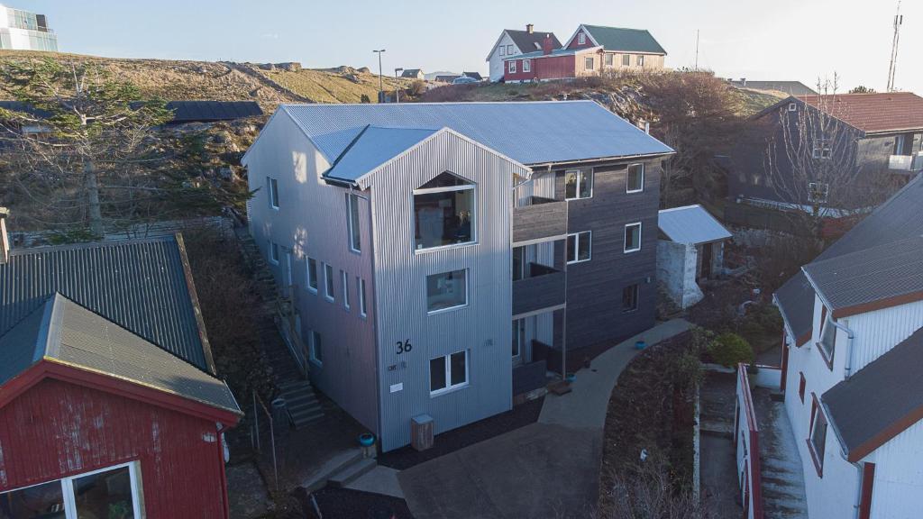an overhead view of a house in a city at Tórshavn Apartment - City Center in Tórshavn