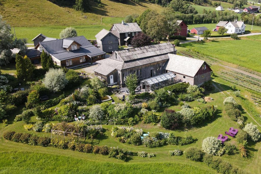 an aerial view of a house with a garden at Store Ringheim Hotel og Restaurant in Vossevangen