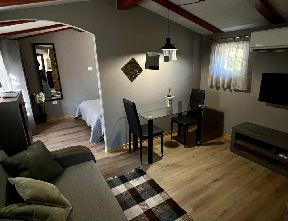 Uma área de estar em Apartment Eos