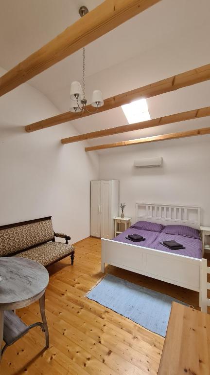 Postel nebo postele na pokoji v ubytování La Bobul Apartments