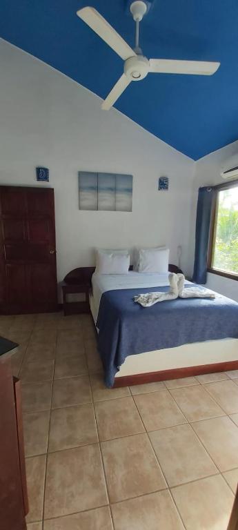 Postel nebo postele na pokoji v ubytování Massai Apartments