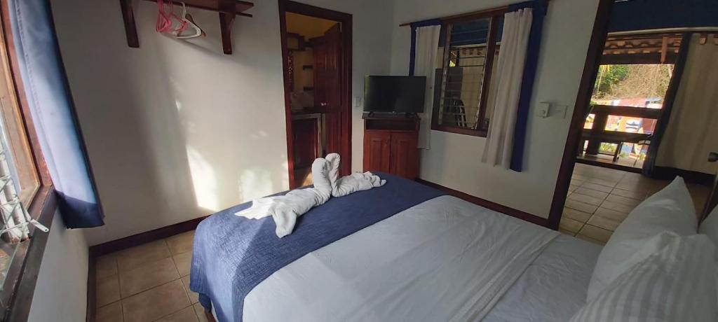 Postel nebo postele na pokoji v ubytování Massai Apartments