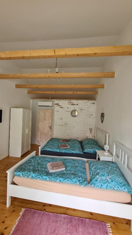 Postel nebo postele na pokoji v ubytování La Bobul Apartments