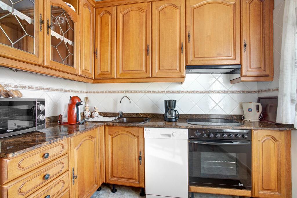Kuchyň nebo kuchyňský kout v ubytování Apartamento El Quintero
