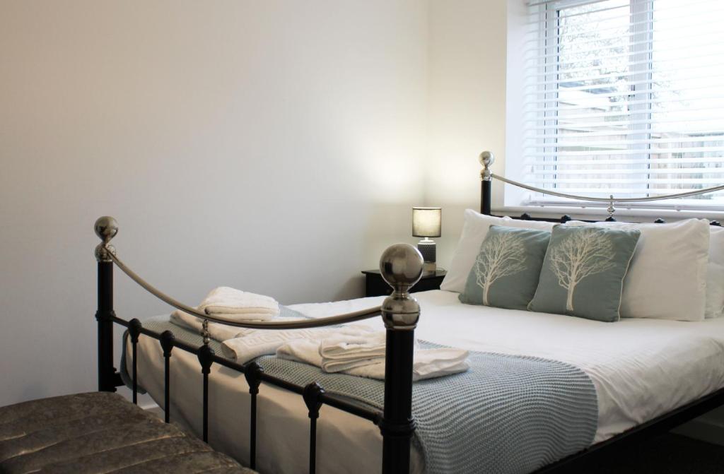 Ένα ή περισσότερα κρεβάτια σε δωμάτιο στο Abingdon - Private Flat with Garden & Parking 02