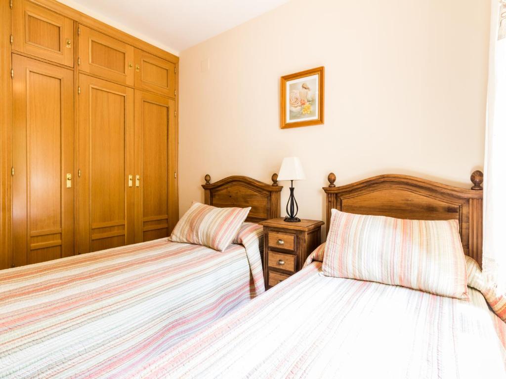 Postel nebo postele na pokoji v ubytování Camino de los molinos