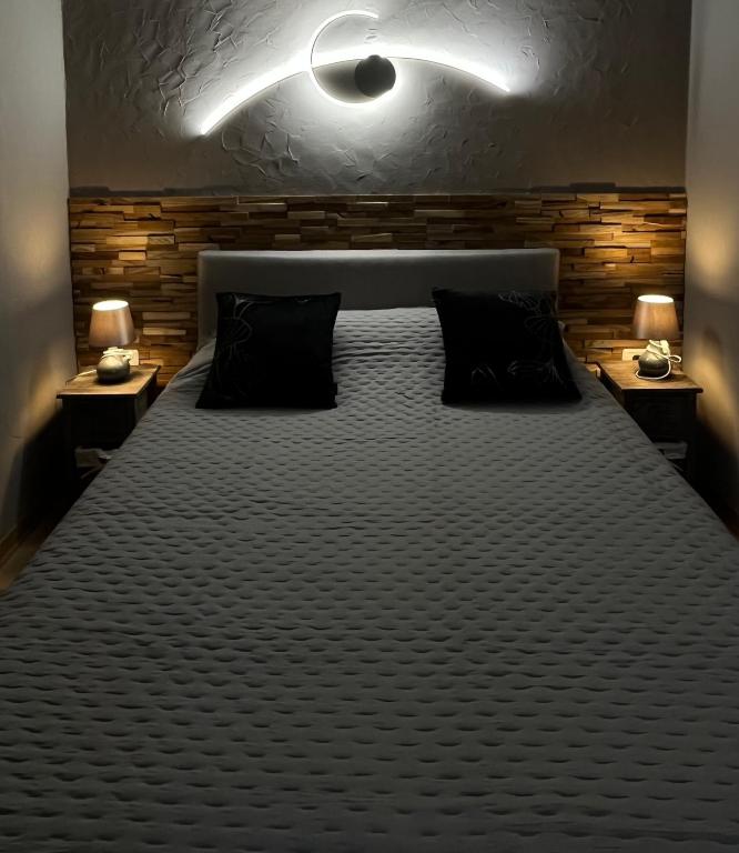 Uma cama ou camas num quarto em Apartment Eos