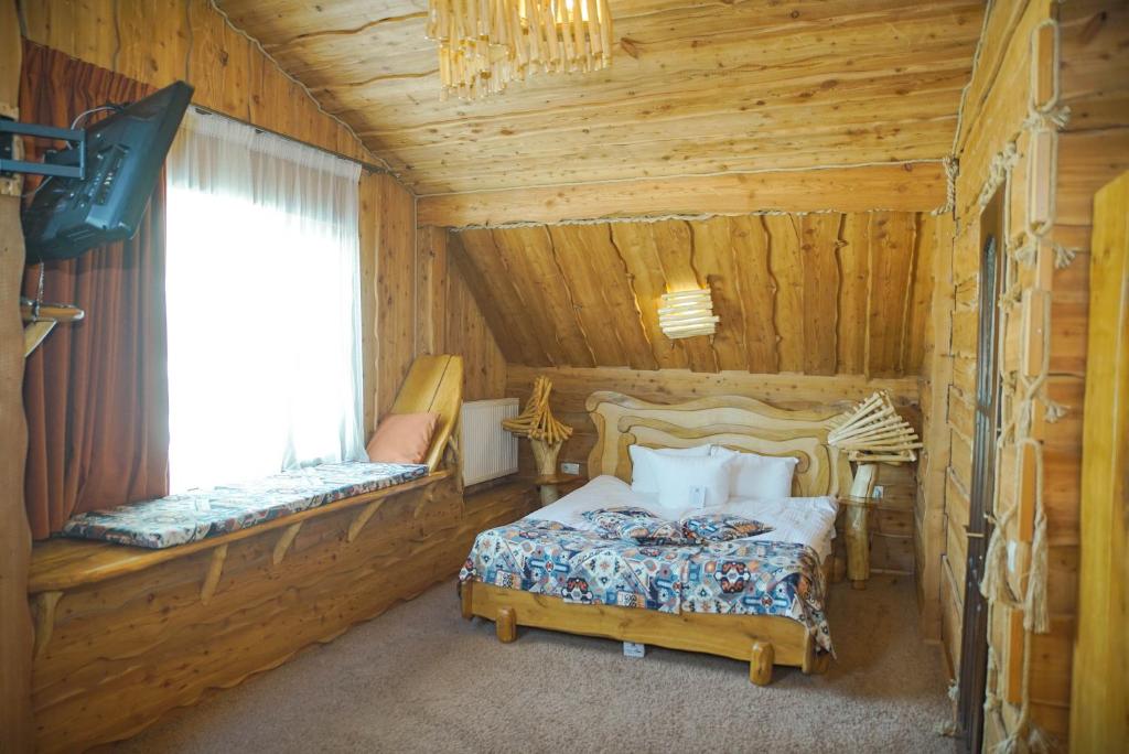 Postel nebo postele na pokoji v ubytování Stara Pravda Hotel - Vykrutasy