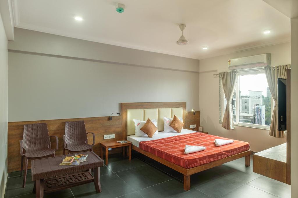 Postel nebo postele na pokoji v ubytování Hotel Opal