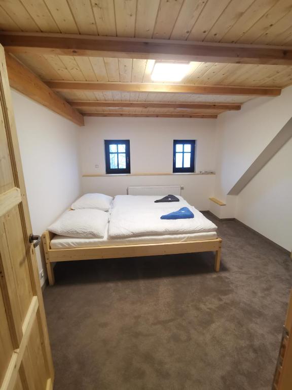 Postel nebo postele na pokoji v ubytování Chata Bramberk