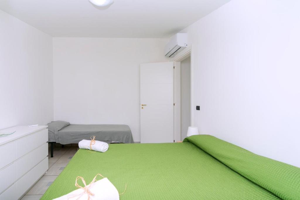 A bed or beds in a room at Brezza dell'Alento