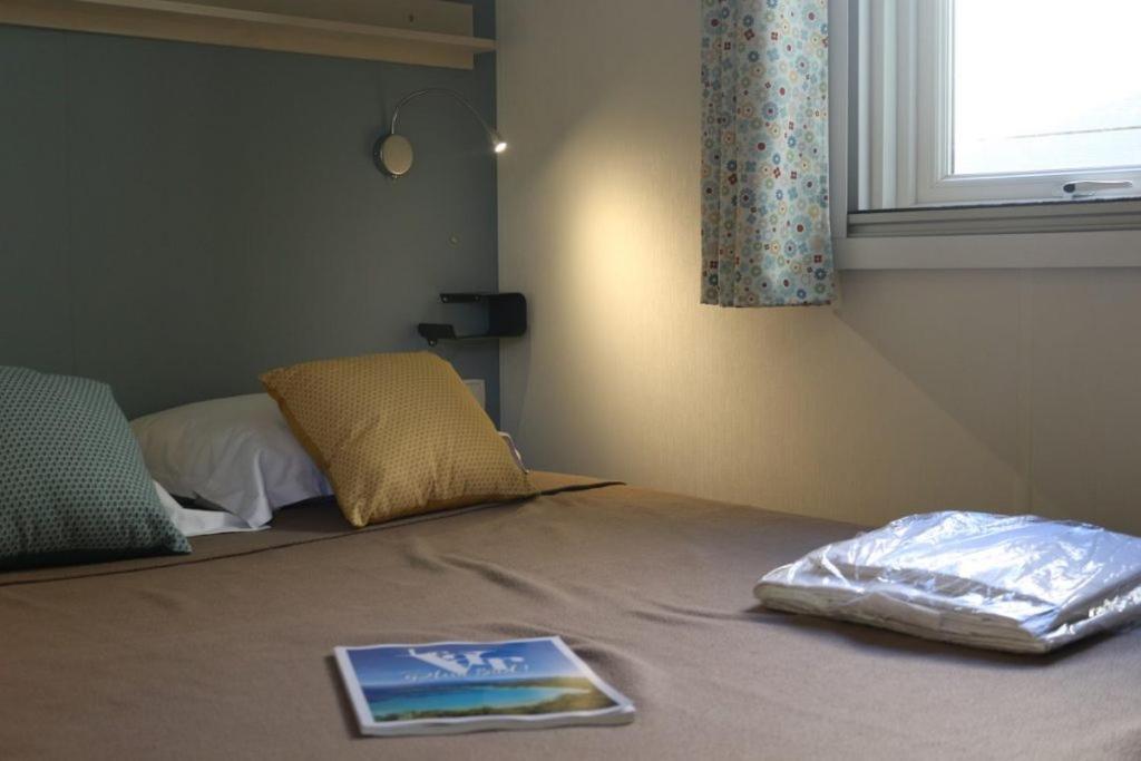 Postel nebo postele na pokoji v ubytování Camping Parc Mogador