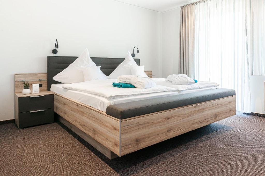 Postel nebo postele na pokoji v ubytování Hotel Die Post Meerfeld