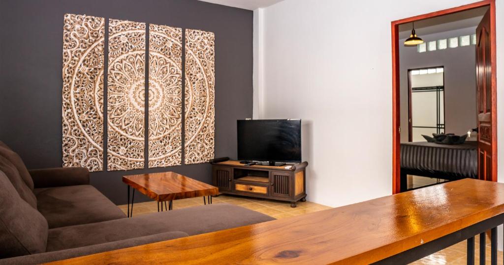 TV a/nebo společenská místnost v ubytování Aqua Suites