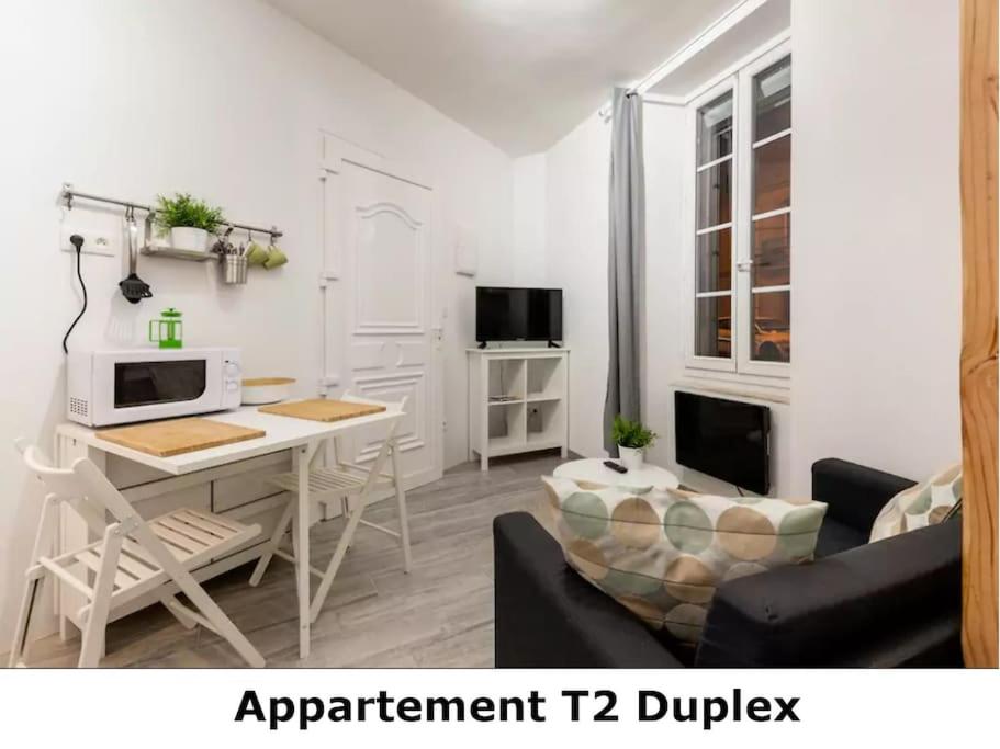 TV a/nebo společenská místnost v ubytování DUPLEX DU GET