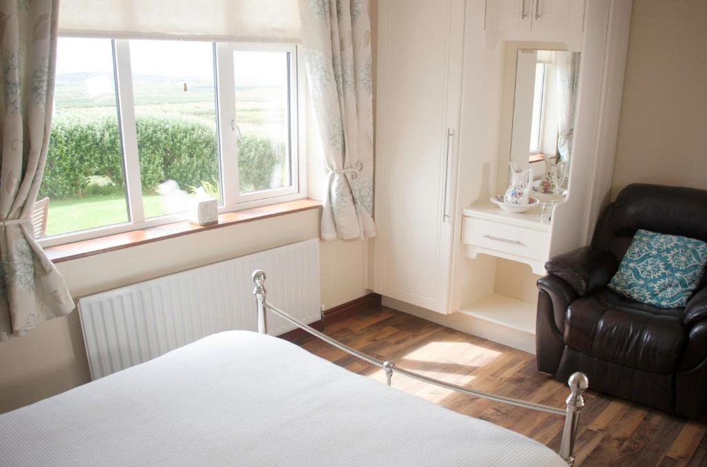 Postel nebo postele na pokoji v ubytování Hilltop B & B