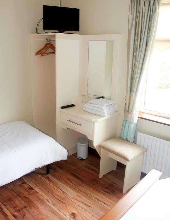Postel nebo postele na pokoji v ubytování Hilltop B & B