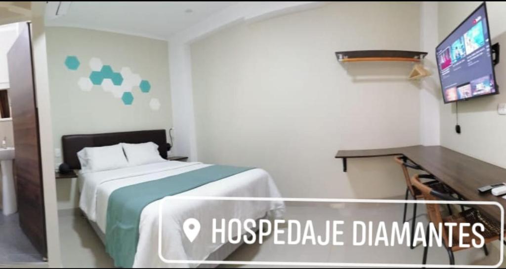 Postel nebo postele na pokoji v ubytování Hospedaje Diamantes