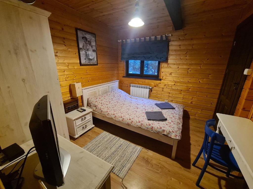 Postel nebo postele na pokoji v ubytování Chata Starych Znajomych