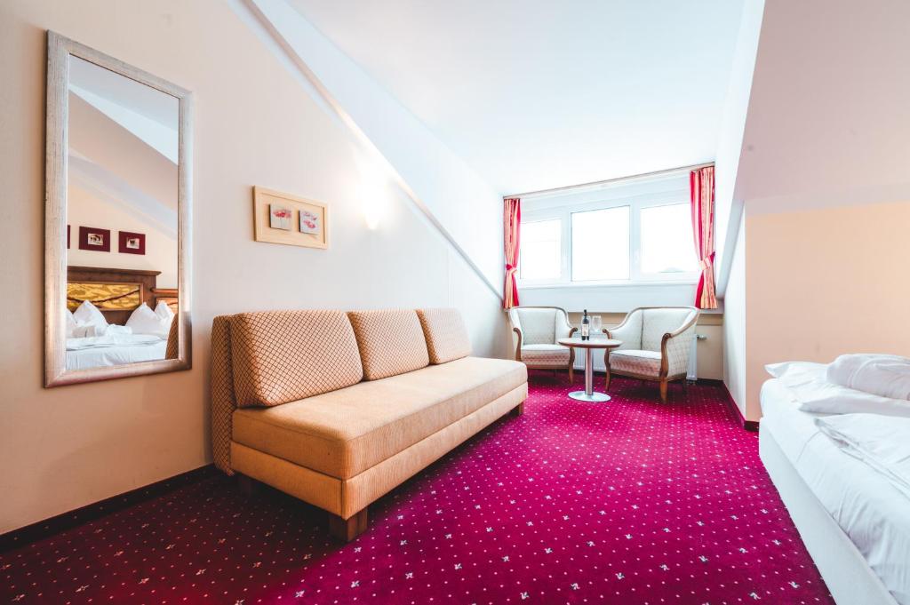 A seating area at Appartements Cella Central